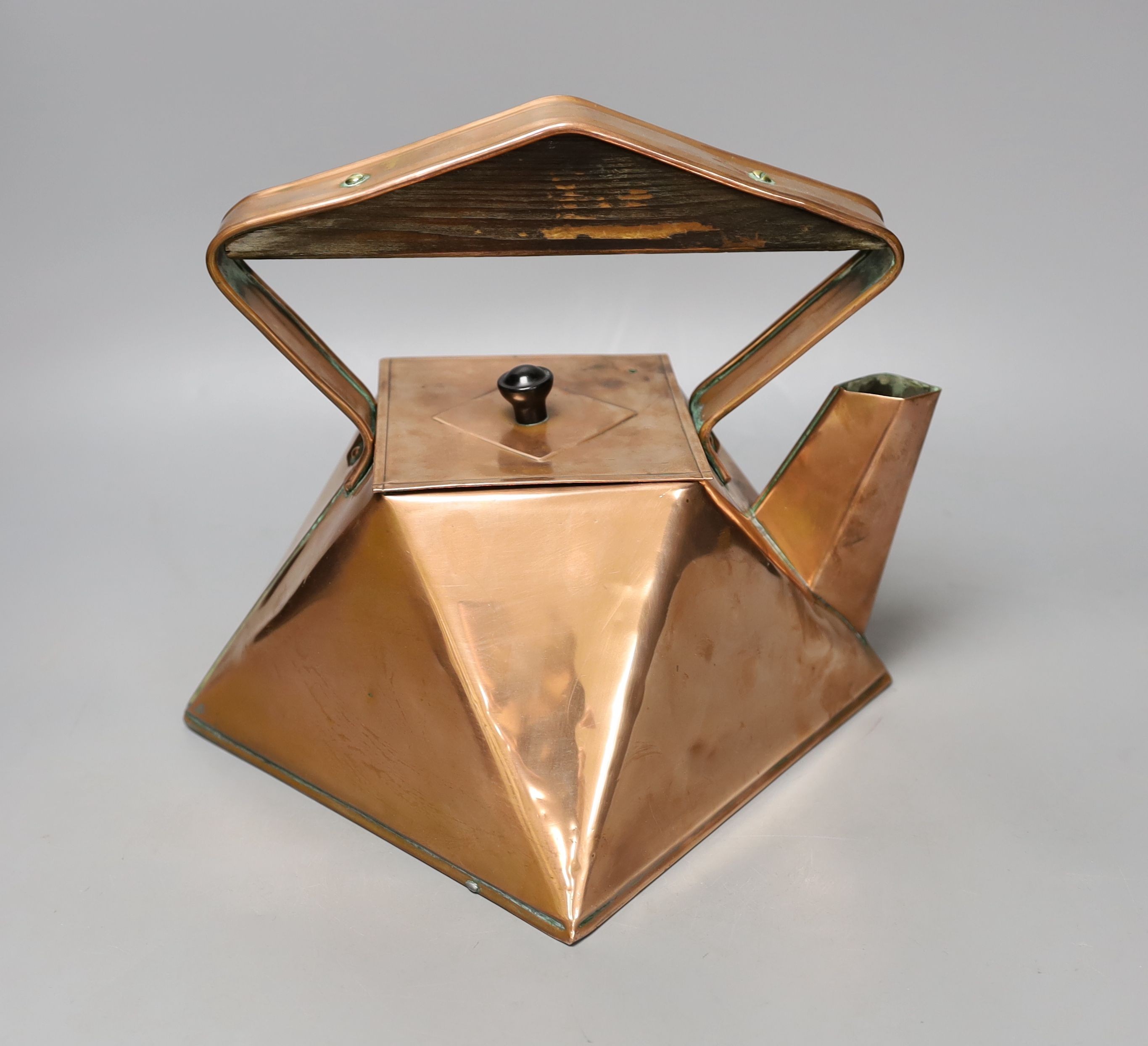 An Arts & Crafts geometric copper kettle, 23cm high, *This lot is being sold in aid of the charity Dogs Trust UK with 100% of the hammer price going to the charity